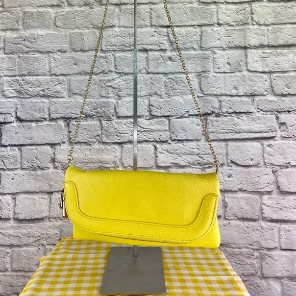 Charming Charlie yellow Shoulder clutch purse